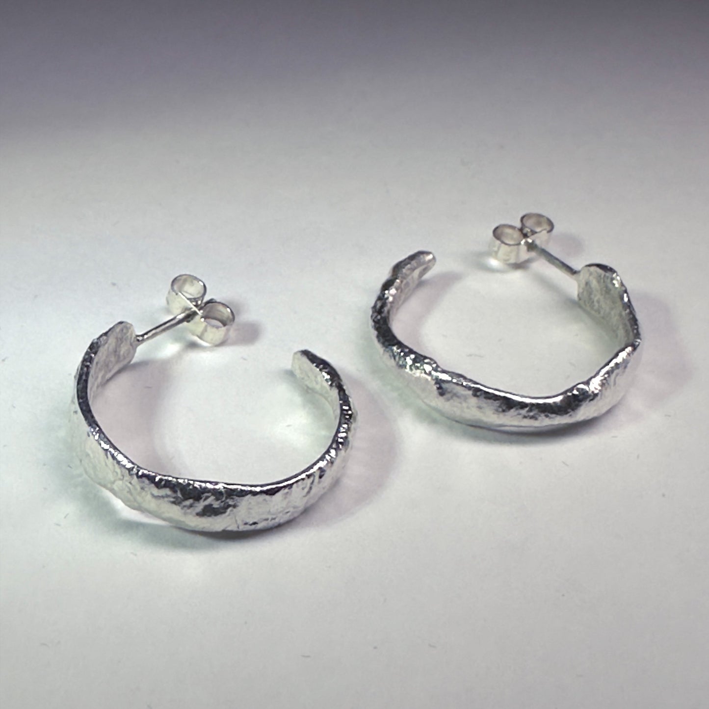 Silver reticulated hoops